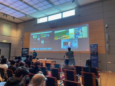 A Matter to Life student asks a question about a presentation within a videoconference