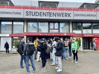 Everyone waiting in front of the cafeteria