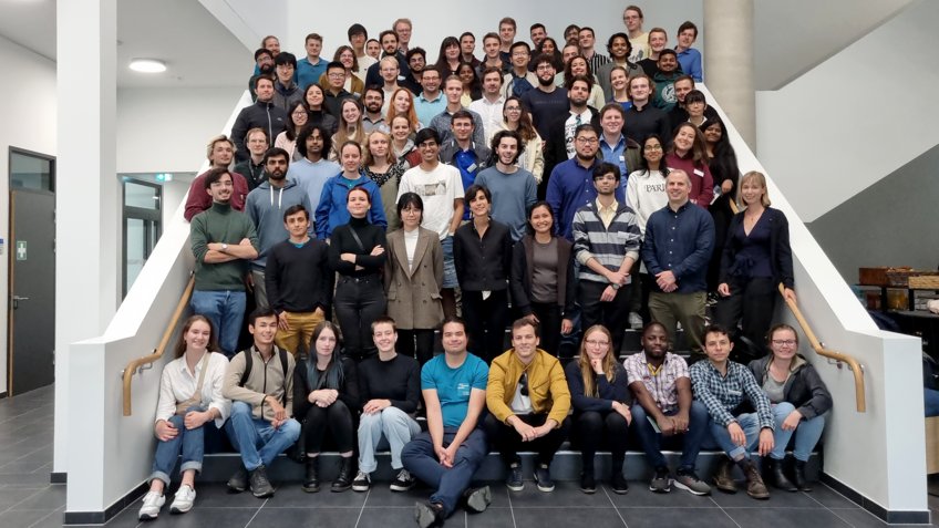 The young bright minds of Matter to Life at the CPA Group picture of around 80 participants on the stairs in the foyer