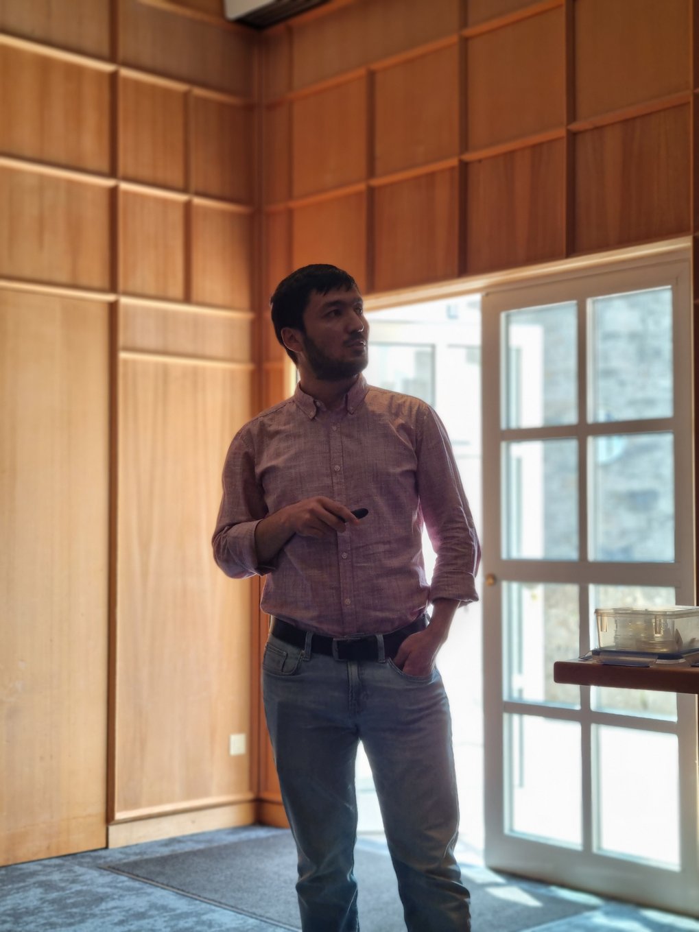 MtL student Sunnatullo Fazliev looks up at his slides during his presentation.