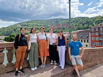 Matter to Life Undergraduate Research Opportunities students and Matter to Life coordinators on the old bridge in Heidelberg