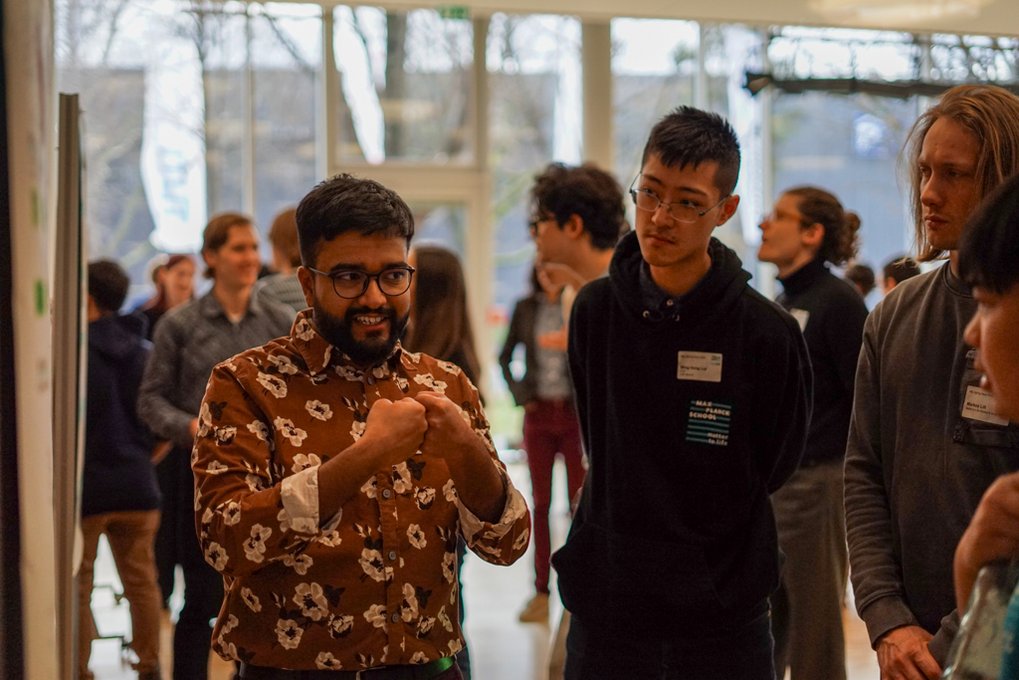 Matter to Life PhD Candidates engaged in conversation 