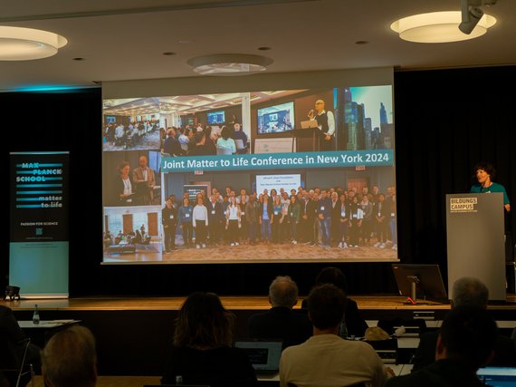Speaker presenting at the Joint Matter to Life Conference 2024 with audience seated and a collage of conference images displayed.