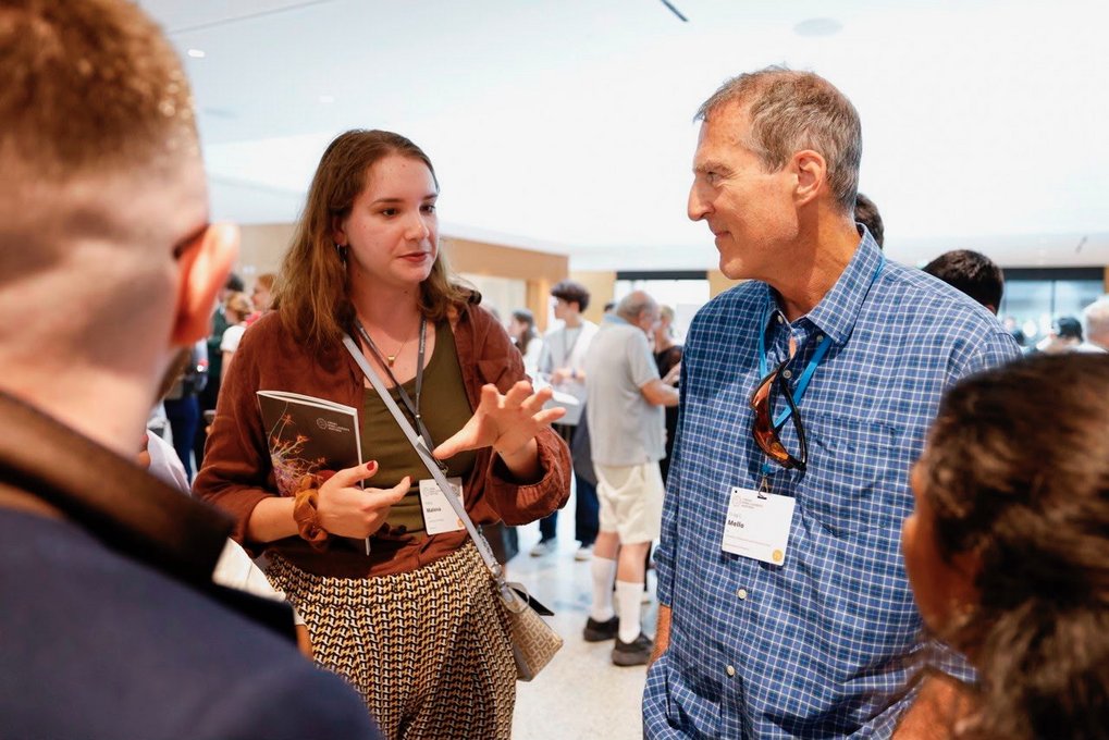 Matter to Life PhD candidate Polina and Nobel Prize Winner Craig Mellow engaged in conversation